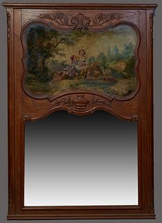 French Carved Oak Trumeau Mirror, 19th c., the stepped crown over relief floral carving above a cartouche shaped oil on board of lovers in a garden, a