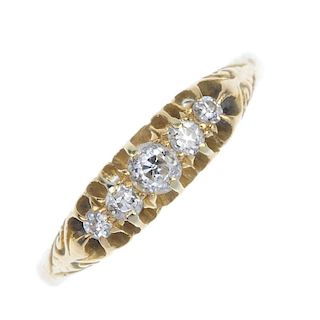 An early 20th century 18ct gold diamond five-stone ring. The graduated old-cut diamonds, to the scro