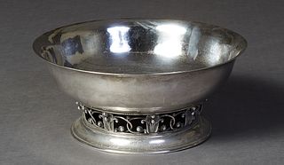 Large Sterling Silver Danish Modern Style Punch Bowl, c. 1950, #9571, in the Jensen taste, hand hammered, the tapering circular bowl on a pierced flor