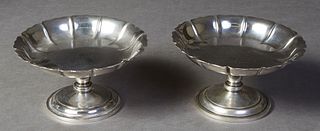 Pair of Sterling Silver Footed Compotes, 20th c., by Crichton & Co., New York, the circular scalloped rim top, on a tapered urn support, to a stepped 