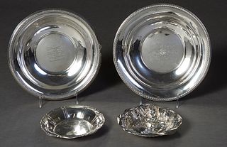 Group of Four Sterling Silver Bowls, 20th c., consisting of an art nouveau floral repousse example by R. Wallace & Son, H.- 1 in., Dia.- 6 in.; a ribb