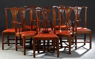 Set of Eight (6 +2) Carved Mahogany Chippendale Style Dining Chairs, 20th c., the serpentine crest rail over a pierced intertwined back splat, to a tr