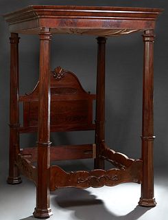 Southern American Classical Style Carved Mahogany Full Tester Bed, 19th c., the canted corner ogee tester on tapered octagonal posts, with a gathered 