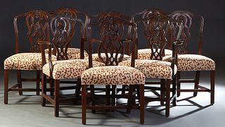 Eight (6+2) Carved Mahogany Chippendale Dining Chairs, 20th c., the arched crest rail over an intertwined pierced leaf carved vertical splat to cushio