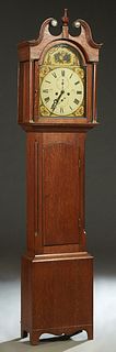 English Carved Oak Tallcase Clock, 19th c., the broken arch top with a central turned finial over an arched glazed door enclosing a hand painted arche