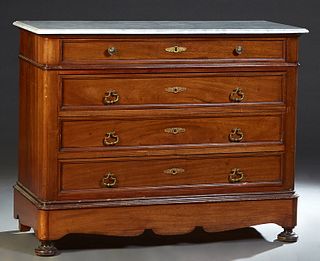 French Carved Walnut Marble Top Commode, c. 1870, the stepped rounded edge figured white marble over a frieze drawer and three deep drawers, on a plin
