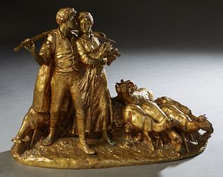 Giuseppe D'Aste (1881-1945, Italian), "Pastoral Scene," 20th c., gilt bronze, depicting a shepherd and a girl carrying wheat, surrounded by a flock of