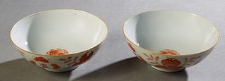 Pair of Chinese Porcelain Qing Dynasty Style Footed Bowls, 19th c., with orange floral decoration, one with a painted mark on the underside, both with