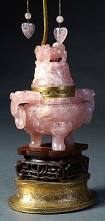 Chinese Rose Quartz Censer, early 20th c., with a Foo dog lid over sides with dragon ring handles, on a mahogany plinth, on an incised brass base, H.-
