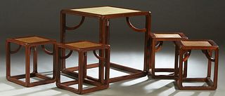 Diminutive Asian Inspired Five Piece Carved Elm Dining Suite, 20th c., consisting of an inset marble top square table, and four rattan top stools, on 