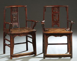 Pair of Chinese Elm Official's Armchairs, 19th c., the curved canted back with a pierced vertical splat flanked by two curved arms, to a rectangular s