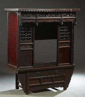 Mixed Woods Meditation Shrine/Cabinet, early 19th c., Shanxi province, the dentillated crown over pierced panels and cylindrical columns, flanking a c