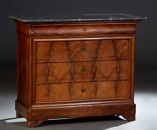 French Louis Philippe Carved Walnut Marble Top Commode, 19th c., the figured rounded corner gray marble over a cavetto frieze drawer and three setback