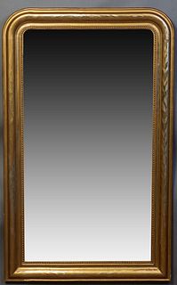 French Louis Philippe Gilt and Gesso Overmantel Mirror, 19th c., the stepped rounded corner frame with incised leaf decoration, around a beaded liner 