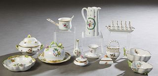 Fourteen Pieces of Herend Porcelain, Hungary, 20th c., consisting of a toast rack; a milk pitcher; a covered butter dish; a small oval covered tureen;