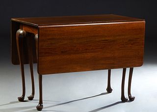 English Carved Mahogany Drop Leaf Queen Anne Dining Table, 20th c., the rounded corner leaves, on gate leg supports, H.- 30 1/4 in., Closed W.- 23 1/2