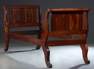 American Classical Carved Mahogany Sleigh Bed, 19th c., the scrolled end is joined by wooden rails, on large cabriole legs. H.- 44 in., Interior W.- 3