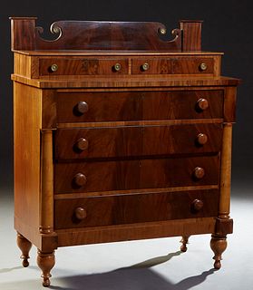 American Federal Style Mahogany Manor House Chest two shallow frieze drawers, over three setback deep drawers, flanked by engaged columns, on a plinth