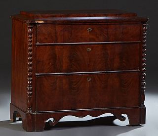 American Classical Carved Mahogany Chest, 19th c., stepped rounded corner top over three graduated deer drawers flanked by engaged bobbin turned pilas