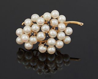 Lady's 18K Yellow Gold Spray Brooch, mid 20th c., mounted with 25 6mm white cultured pearls, and five .05 ct. round sapphires, H.- 1 1/4 in., W.- 2 1/