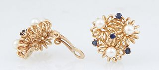 Pair of 14K Yellow Gold Clip Earrings, mid 20th c., each with three relief flowers with three 4mm white cultured pearls and four round .03 ct. sapphir