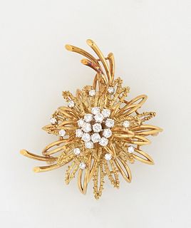 Lady's 18K Yellow Gold Floral Spray Brooch, mid 20th c., the center with six 10 point round diamonds and 6 round 15 point diamonds, within an outer bo