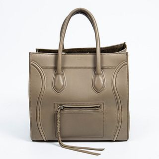 Celine Phantom Handbag, in dune grained calf leather with metal brass hardware, opening to a olive green suede lined interior with a side zipper pocke