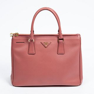 Prada Galleria Zip Handbag, in pink Saffiano lux calf leather with gold hardware, opening to a hot pink Prada monogrammed interior with two large zip 