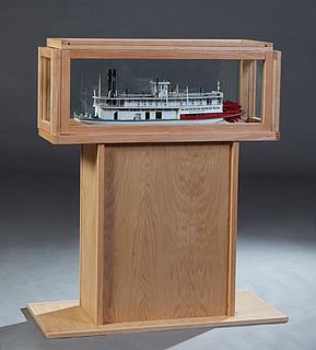 Ship Model, "Destrehan," scratch-built model, 20th c., of a paddle wheeler, from the builder's plans, presented in a custom oak glass case, on a plint
