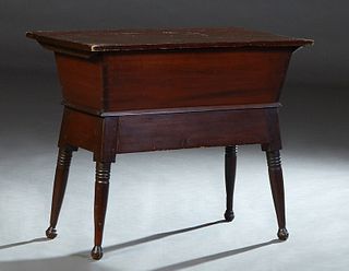 American Carved Walnut Dough Box, 19th c., Pennsylvania, the rectangular removable lid over sloping sides on splayed turned tapered legs, H.- 30 3/8 i