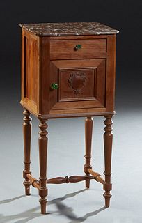 French Carved Cherry Marble Top Nightstand, late 19th c., the canted corner highly figured brown marble over a frieze drawer and a pot cupboard, on tu