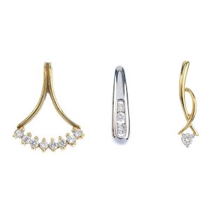 A selection of three diamond pendants and one ear pendant. To include an 18ct gold graduated brillia