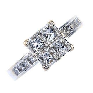 An 18ct gold diamond dress ring. The square-shape diamond panel, with square-shape diamond line side