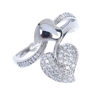 A diamond dress ring. Of foliate design, the pave-set diamond and polished stylised leaves, with alt