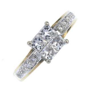 An 18ct gold diamond dress ring. The square-shape diamond panel, with brilliant-cut diamond line sid