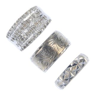 A selection of three 9ct gold rings. To include a baguette and single-cut diamond panel ring, togeth