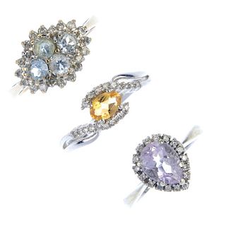 A selection of three 9ct gold diamond and gem-set rings. To include a blue-topaz and diamond ring, a