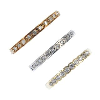 A selection of three diamond eternity rings. To include an 18ct gold brilliant-cut diamond full-circ