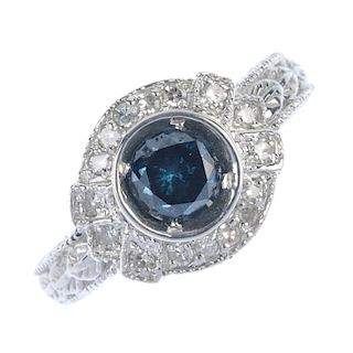 A 14ct gold treated diamond and diamond cluster ring. The treated blue brilliant-cut diamond, within