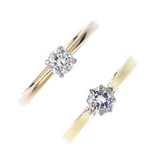 Two gold diamond single-stone rings. Each designed as a brilliant-cut diamond, to the tapered should