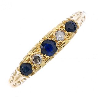 A sapphire and diamond five-stone ring. The alternating graduated circular-shape sapphire and single
