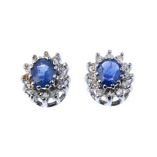 A pair of 18ct gold sapphire and diamond cluster ear studs and a diamond pendant. The ear studs each