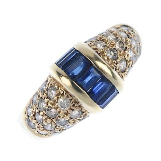 A sapphire and diamond dress ring. The rectangular-shape sapphire line, with bar sides, to the pave-