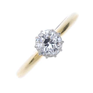 A diamond single-stone ring. The circular-cut diamond, to the openwork gallery and tapered band. Est
