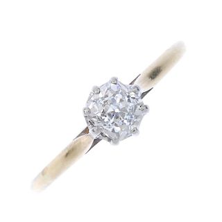 A diamond single-stone ring. The old-cut diamond, with bi-colour mount and band. Estimated diamond w