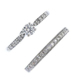Two 9ct gold diamond dress rings. The first designed as a brilliant-cut diamond, to the similarly-cu