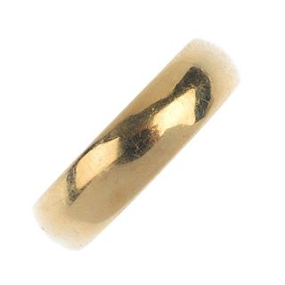 An early 20th century 22ct gold band ring. Hallmarks for Glasgow, 1915. Width 6.2mms. Weight 11.2gms