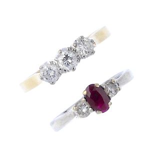 An 18ct gold diamond three-stone ring, together with a 9ct gold ruby and diamond three-stone ring. T
