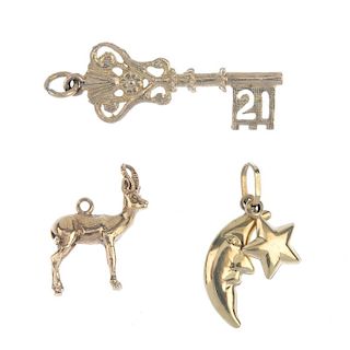 A selection of six charms. To include a 9ct gold antelope charm, a 9ct gold sailing boat charm, toge