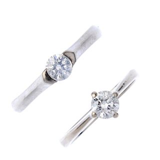 Two 18ct gold diamond single-stone rings. Each designed as a brilliant-cut diamond, to the tapered o